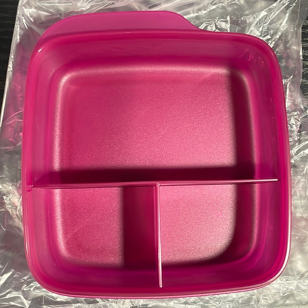 Divided container with leak proof seal